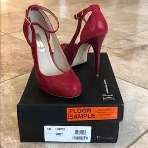 Size 6 INC Lucy pumps in red